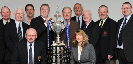 Stephen Cruise of the Ulster Bank (hand on trophy) with members of the NUC Management Board