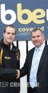 Alan Hunter, Director, Abbey Insurance Brokers congratulates Lurgan Cricket Club captain, Peter Maxwell on gaining promotion to the Premier League