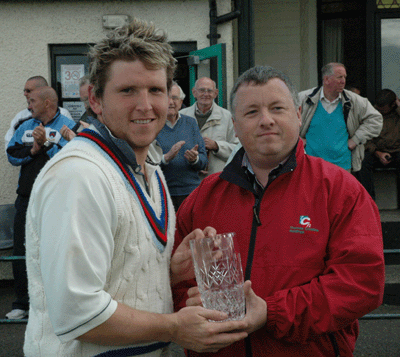 Man of the Match Gary Wilson receives his award from Kieran Moloney for TCH Democrat Media (C) I Shields