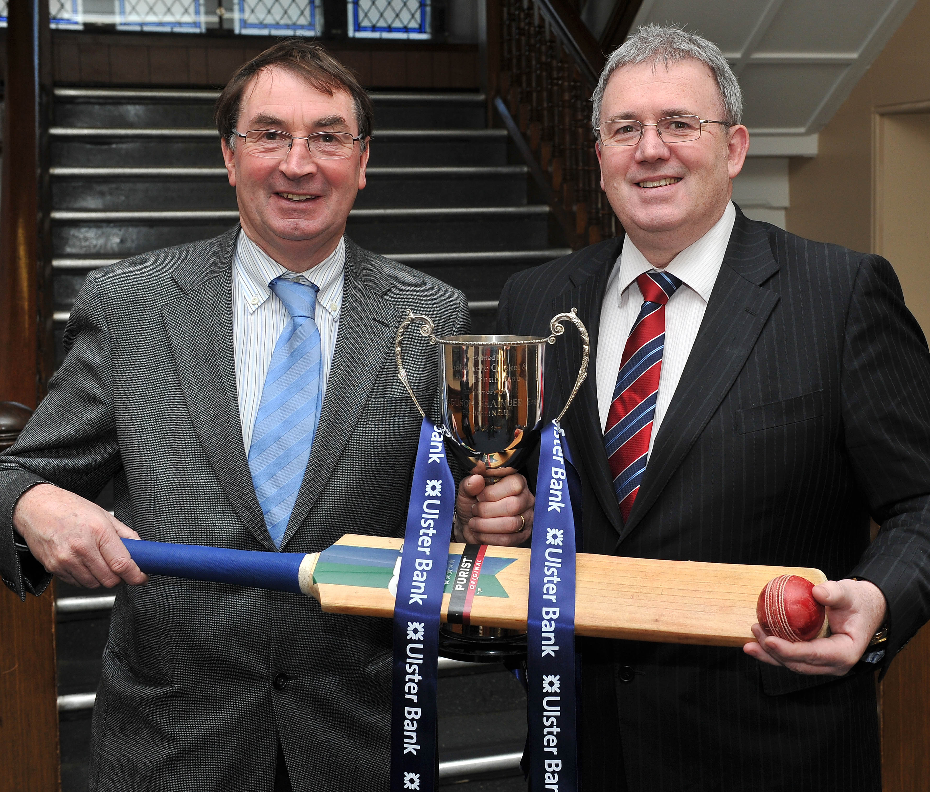 NCU President Chris Harte and Stephen Cruise from the Ulster Bank make the draw for this year's Schools Cup
