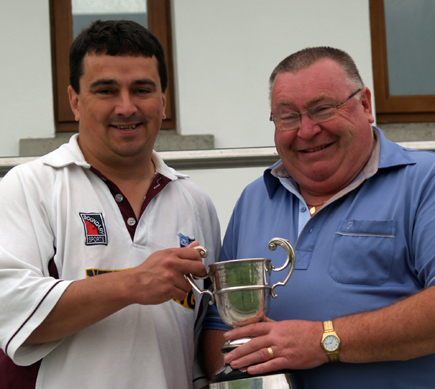 Robin Glenn presents Leslie Allen with the Intermediate League Three trophy